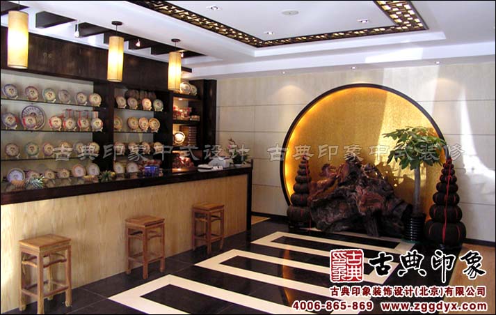 金壶堂中式茶馆吧台设计,月洞门及根雕,普洱茶饼塔形成独特的风景